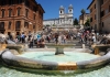 The Spanish Steps, as seen from the Fontana della Barcaccia in the Piazza di Spagna, Sallustiano obelisk against background of the Church of the Santissima TrinitÃ  dei Monti. Rome, Italy.